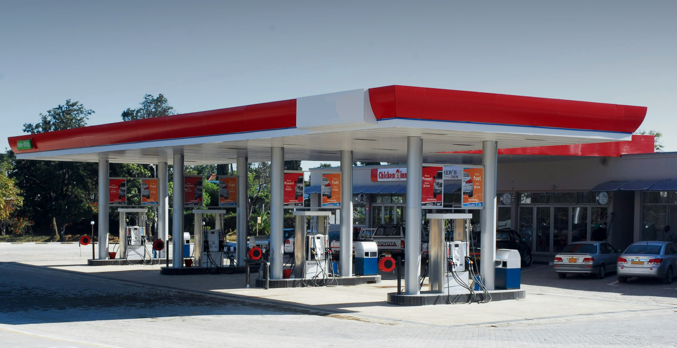 Ticket de Mi Gasolina junto a una computadora para facturación